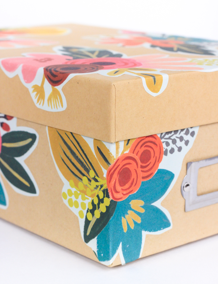 Make over those boring storage boxes with this easy decoupage tutorial!