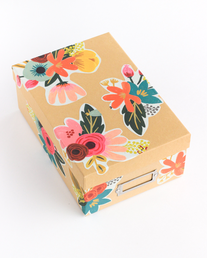 Make over those boring storage boxes with this easy decoupage tutorial!