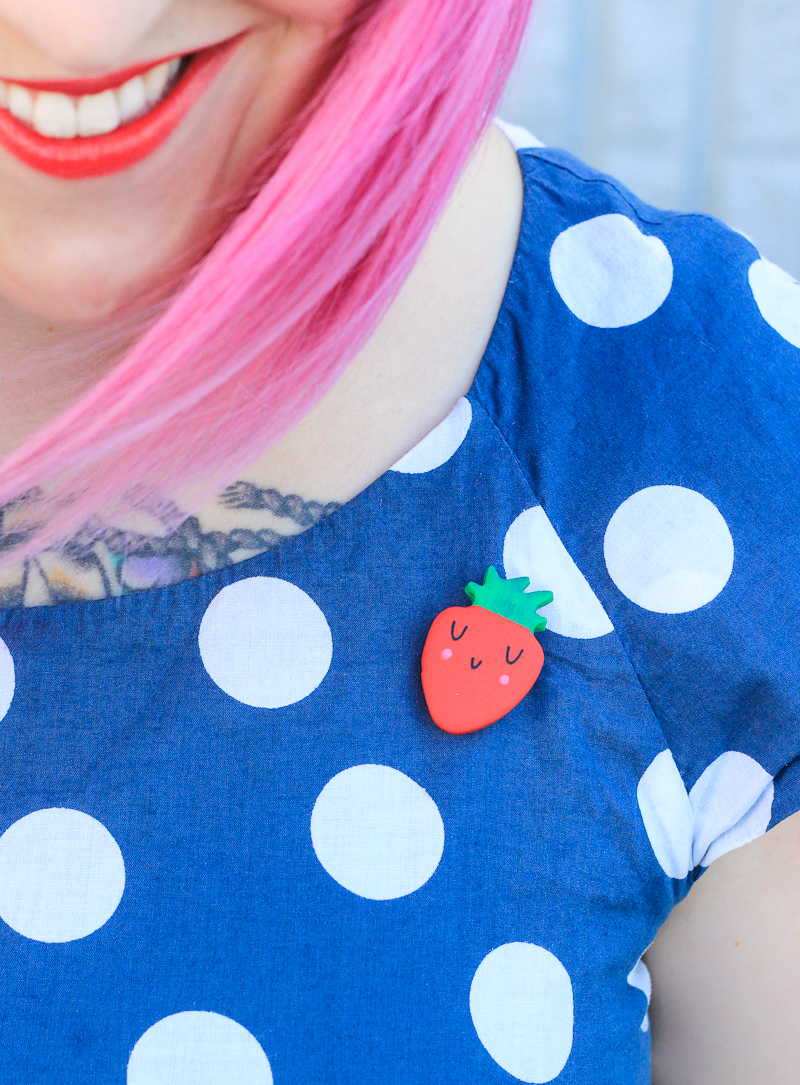 Dress up your wardrobe in no time with these diy clay strawberry brooches!
