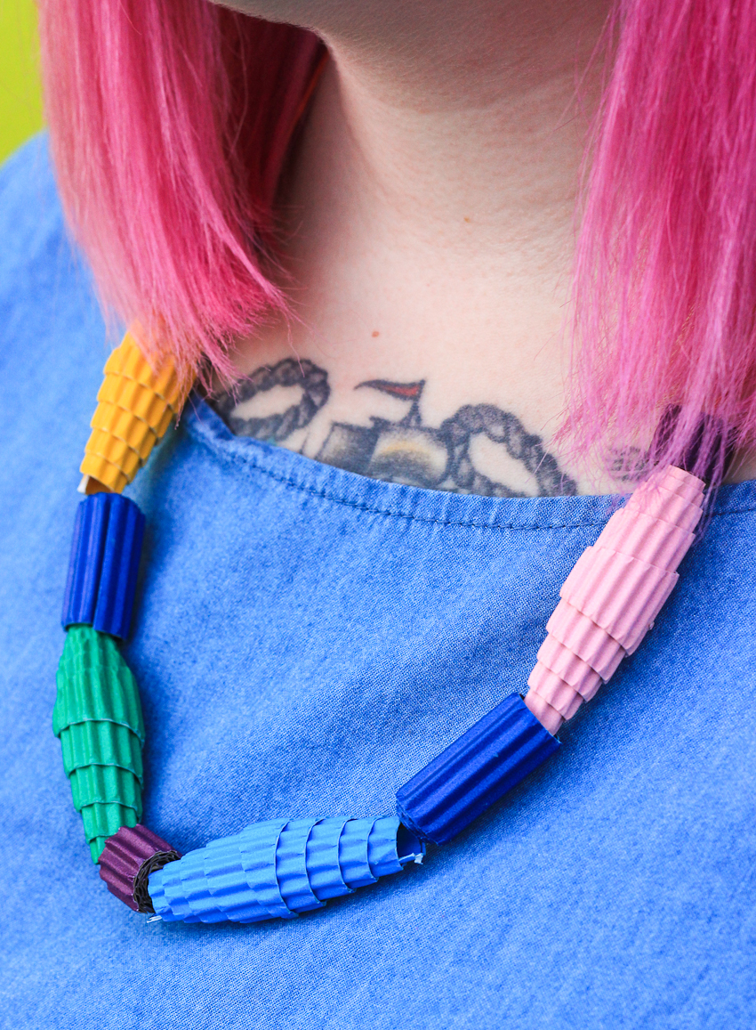 Learn to make a killer statement necklace in 20 minutes using only cardboard and glue!