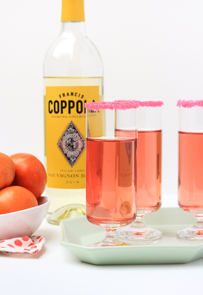 Make a batch of pomegranate orange spritzers for Valentine's Day brunch!