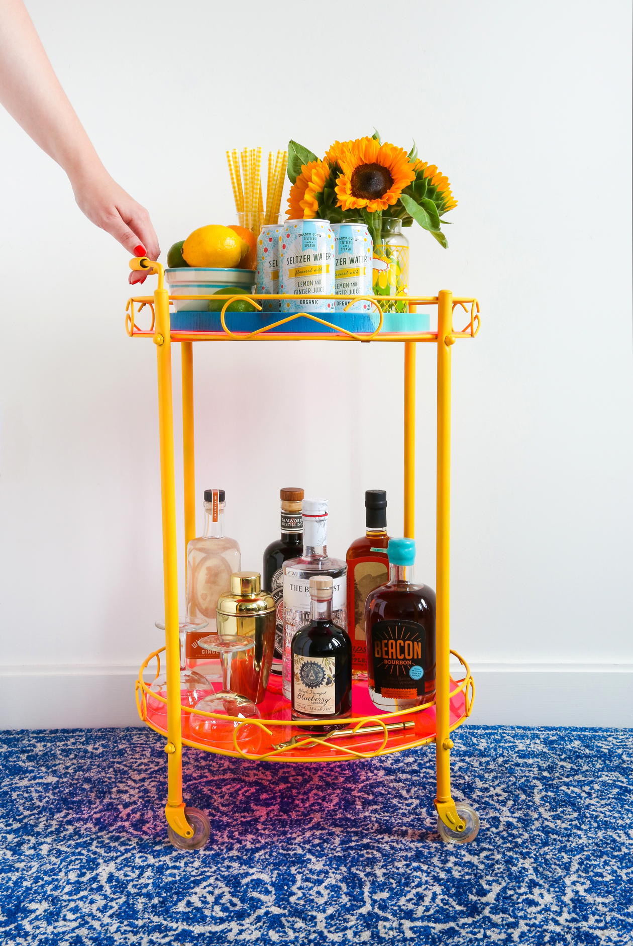 See how this piece found in the trash got a new life with this DIY Colorful Bar Cart Makeover!