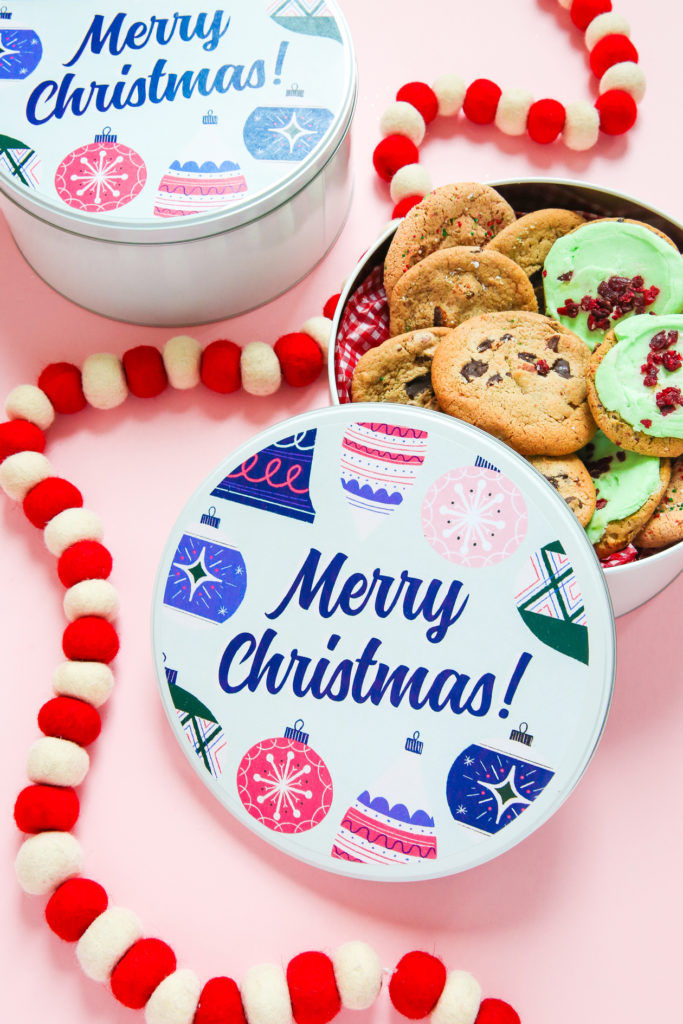Hosting a Christmas cookie exchange?? Then you'll want to grab this free printable! Making these Christmas cookie tins is as easy as click, print, and cut!