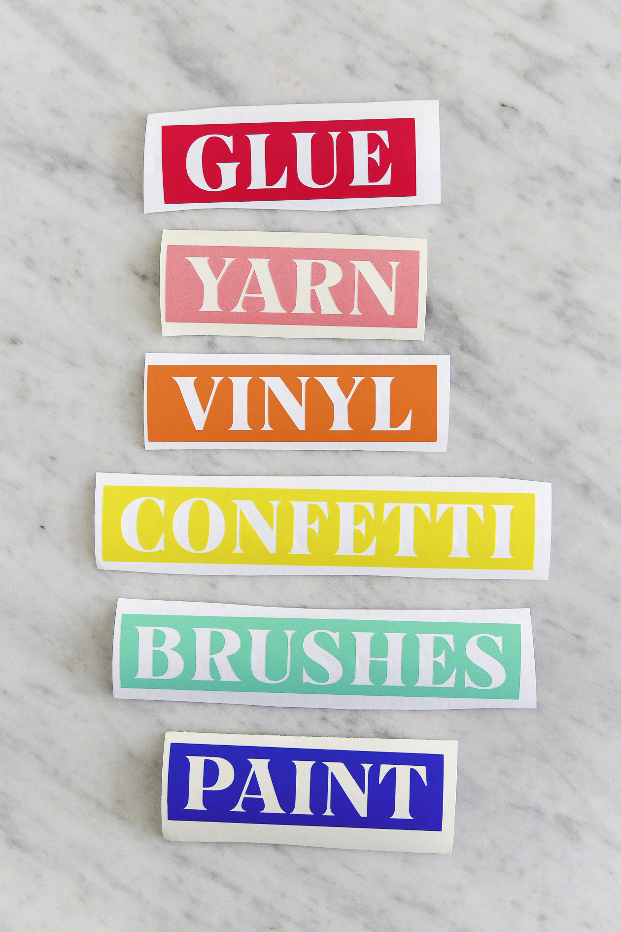 Organize your craft room with this easy DIY project! Making your own craft room labels is as easy as pressing print. Plus DIY Craft Room Labels are a great way to add color to your organization. 