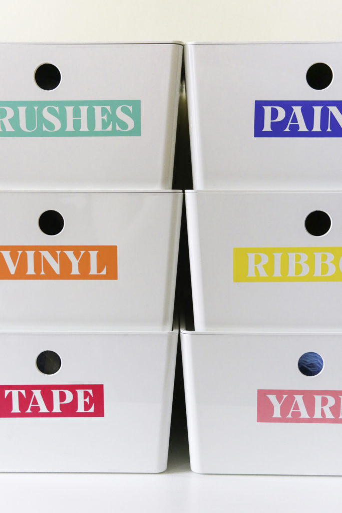Organize your craft room with this easy DIY project! Making your own craft room labels is as easy as pressing print. Plus DIY Craft Room Labels are a great way to add color to your organization.