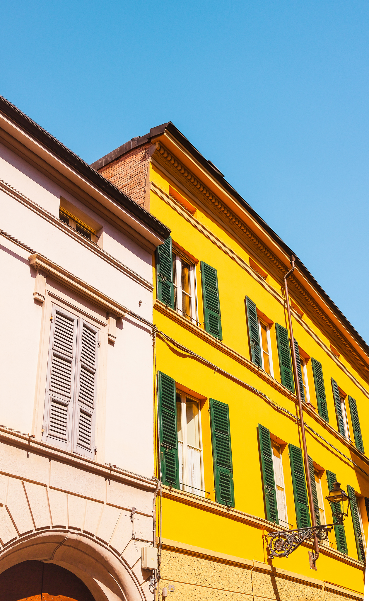Bright colorful houses line the streets of Parma Italy