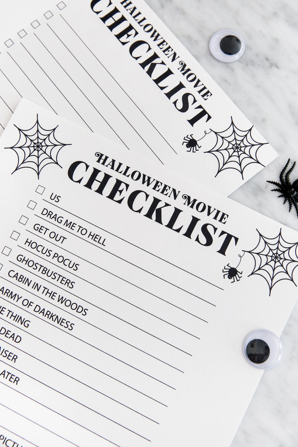 Watch all the spooky movies this fall with this Halloween Movie Checklist Printable! Just download and print at home for free!
